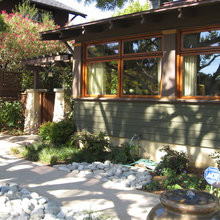 landscape front & driveway side of house