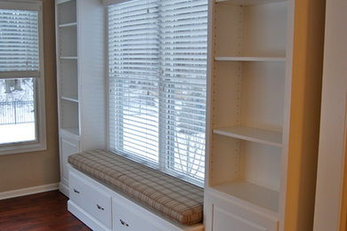 Large transitional enclosed dark wood floor living room library photo in Cleveland with no tv, no fireplace and beige walls