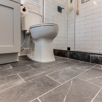 Gray Marble Tile and Shower Curb Detail