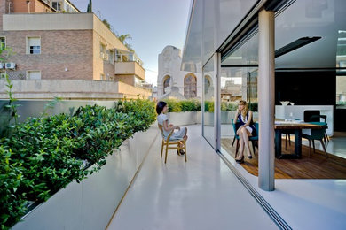 Inspiration for a large contemporary balcony remodel in Other