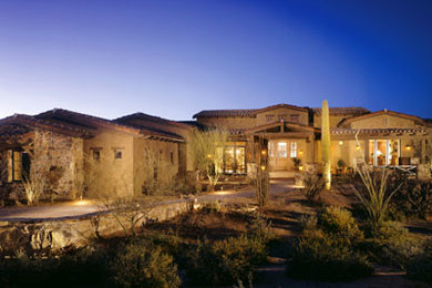 Rustic exterior home idea in Phoenix