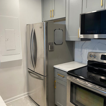 Gray Shaker Kitchen Remodel with Gold Hardware in Arlington, VA