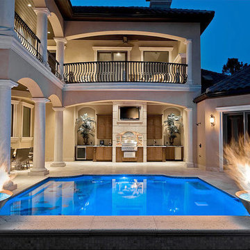 Outdoor kitchen by pool