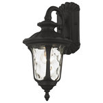 Livex Lighting - Textured Black Traditional, Victorian, Sculptural, Outdoor Wall Lantern - From the Oxford outdoor lantern collection, this traditional cast aluminum downward hanging single-light small wall lantern design will add curb appeal to any home. It features a handsome, antique-style wall plate and decorative arm. Clear water glass casts an appealing light and lends to its vintage charm. Wall plate, arm and other details are all in a textured black finish. With superb craftsmanship and affordable price, this fixture is sure to tastefully indulge your senses.