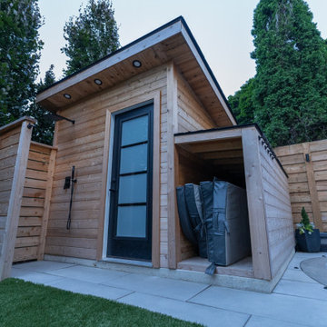 Pool with Rock Waterfall and Storage Shed