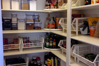 Inspiration for a large timeless l-shaped kitchen pantry remodel in Salt Lake City with no island
