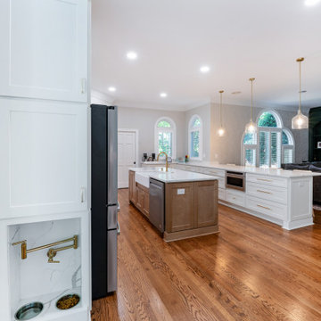 Open Concept Kitchen with Large Island and Built-In Dog Feeding Station