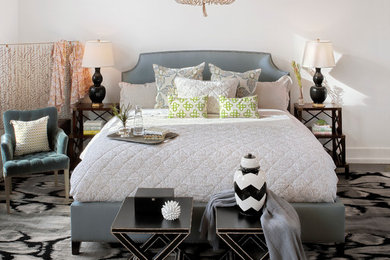 Large transitional master carpeted bedroom photo in Milwaukee with white walls and no fireplace