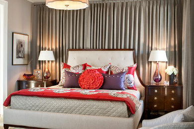Mid-sized transitional master medium tone wood floor bedroom photo in Other with gray walls and no fireplace