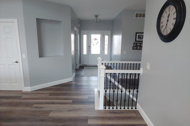 Example of a trendy home design design in Other