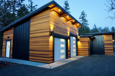 Example of a large trendy detached two-car garage workshop design in Vancouver