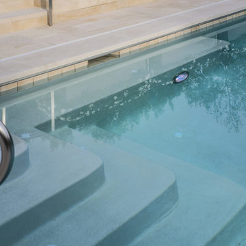 Limestone Pool Deck and Steps into Pool