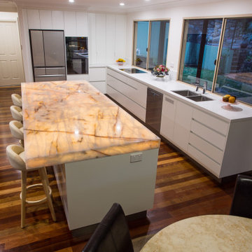 Contemporary kitchen with a stunning illuminated island bench