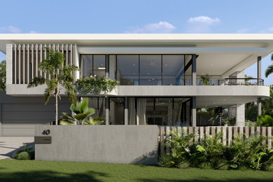 This is an example of a mid-sized modern home design in Sunshine Coast.
