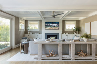 Beach style family room photo in New York
