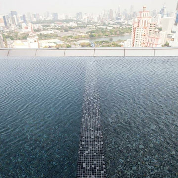Modern pool with custom recycled glass mosaic mix