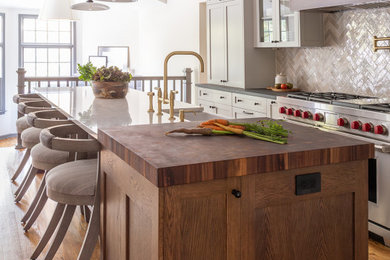 Example of a transitional kitchen design in New York