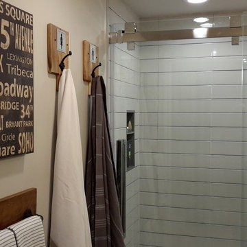 Basement Bathroom bypass glass shower doors