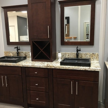Maple wood cabinets shaker style with espresso color and granite counter top wit