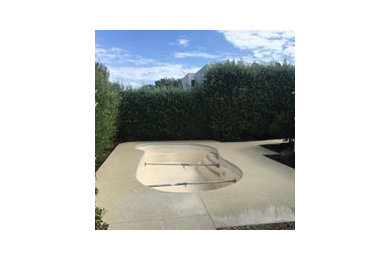 Mid-sized modern courtyard kidney-shaped pool in Perth with concrete slab.
