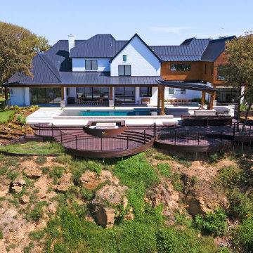 Waterfront deck with pool featuring Rustic Walnut composite decking