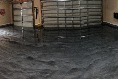 Garage WOW Factor! Custom Metallic Epoxy Concrete Floor