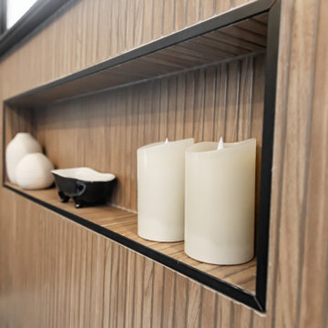 Modern Luxury Master Bathroom with Black Solid Surface Tub