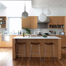 great look-cabinets and orange accents
