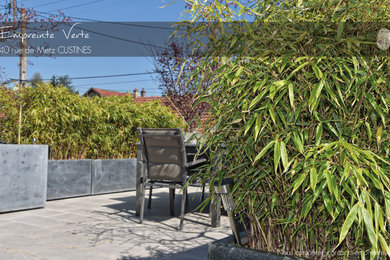 Idée de décoration pour une terrasse design.