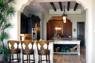 Example of a tuscan kitchen design in Phoenix