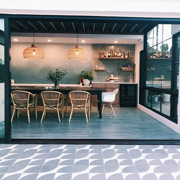 glazed thin brick and encaustic cement tile are the perfect tag team in home