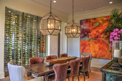 This is an example of a large contemporary dining room in Los Angeles with medium hardwood floors.