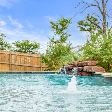 Freeform Pool, beach entry and rock waterfall