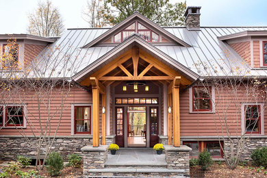 Entryway - large rustic entryway idea in New York with a dark wood front door
