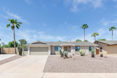 Inspiration for a transitional exterior home remodel in Phoenix