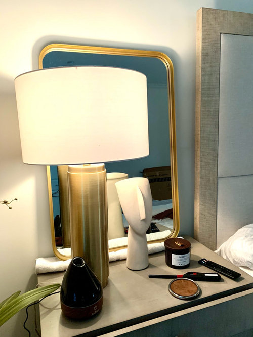 mirrors behind nightstand