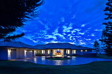Inspiration for a tropical exterior home remodel in Hawaii