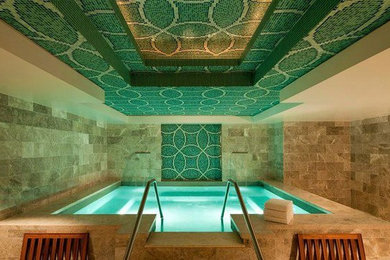 Pool - large traditional courtyard rectangular pool idea in Salt Lake City