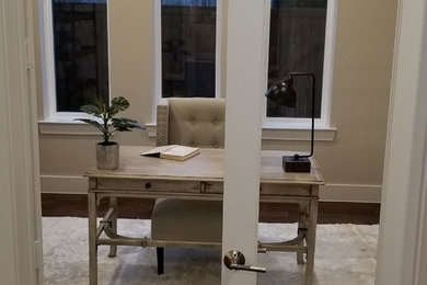 Example of a transitional home office design in Dallas