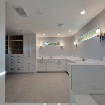 Two separate bathrooms converted into a master bathroom with a big open closet