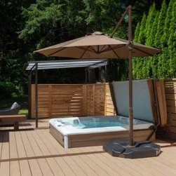 Deckorators Vault Decking in the color Hickory accented by Deckorators Frontier - Deck Tiles And Planks