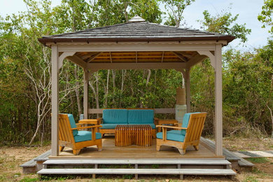 Design ideas for a large traditional backyard patio in Other with a gazebo/cabana.