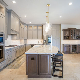 Inspiration for a mid-sized l-shaped kitchen pantry in Jacksonville with an undermount sink, recessed-panel cabinets, brown cabinets, quartz benchtops, white splashback, marble splashback, stainless steel appliances, ceramic floors, with island, multi-coloured floor and white benchtop.