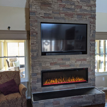 DIY Electric Fireplace and TV Wall with Desert Sunrise Stacked Stone