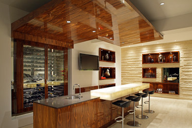 This is an example of a large contemporary wine cellar in Orange County with porcelain floors.