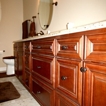 Master Bathroom with Frameless Shower and Jetted Tub