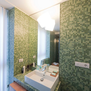 Green glass tiles modern bathroom