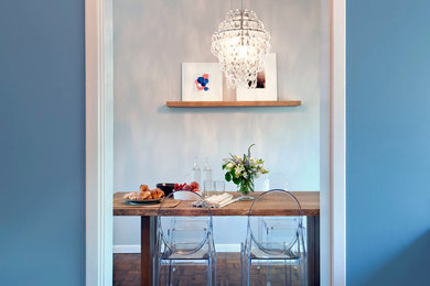 Inspiration for a mid-sized modern dark wood floor and brown floor great room remodel in San Francisco with gray walls and no fireplace