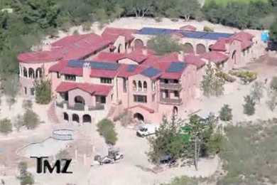 Example of a tuscan exterior home design in Orange County