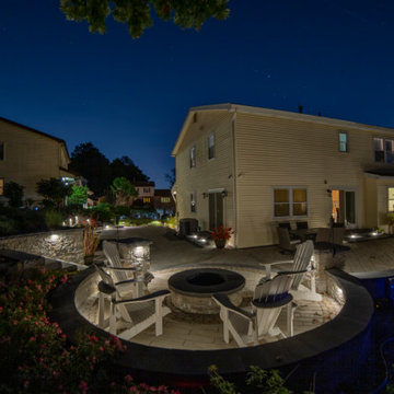 Dual patio with adjoining firepit feature